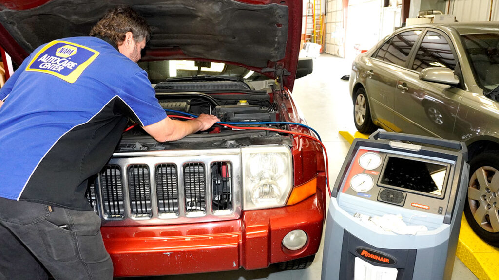 James Bracken ASE Certified Master Tech - replaces refrigerant in SUV